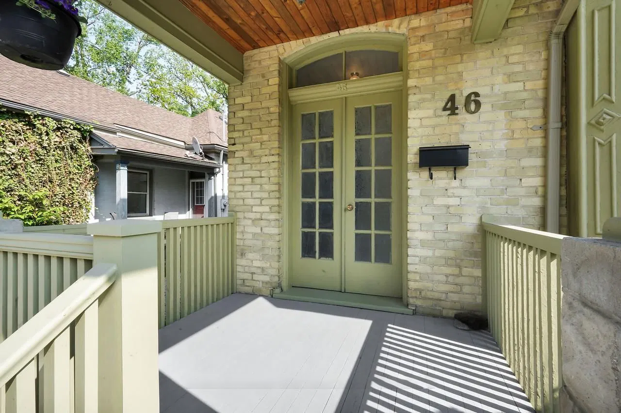 Lavender Flats London Ontario duplex entrance with charming green doors - Wortley Village rental