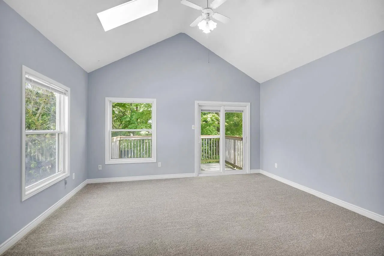 Charming upper unit living room with vaulted ceilings - London Ontario apartment rental